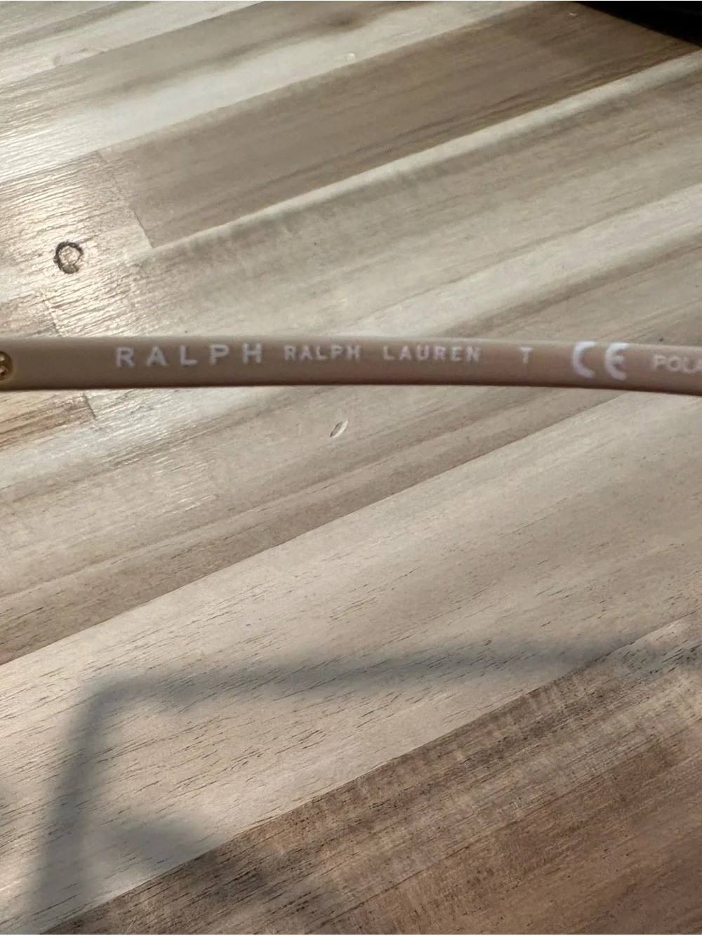 Ralph Lauren Black Sunglasses with Subtle Gold Accents